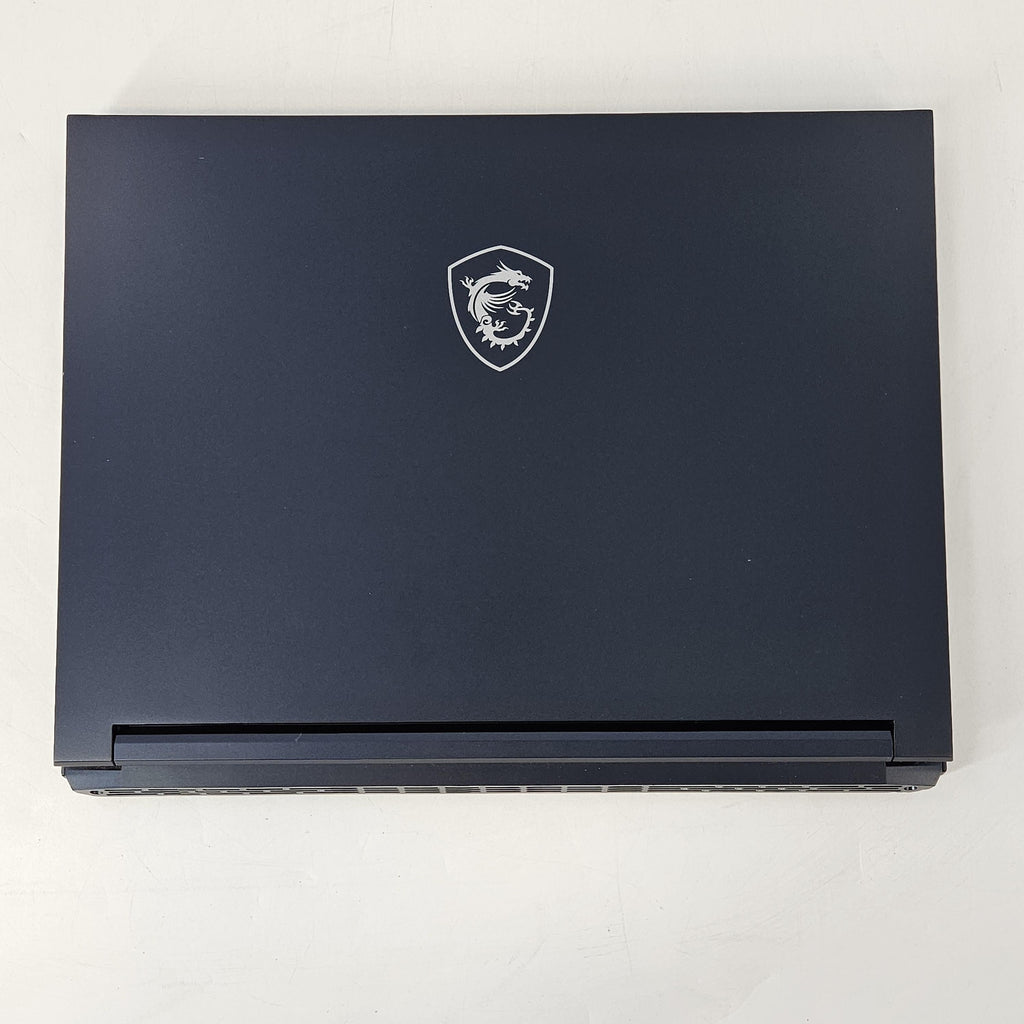 MSI Stealth 14 Studio 14 Blue 2.4 GHz Intel Core i7 13th Gen. 16GB RAM 1TB Solid State Drive NVIDIA GeForce RTX 4060 8 GB