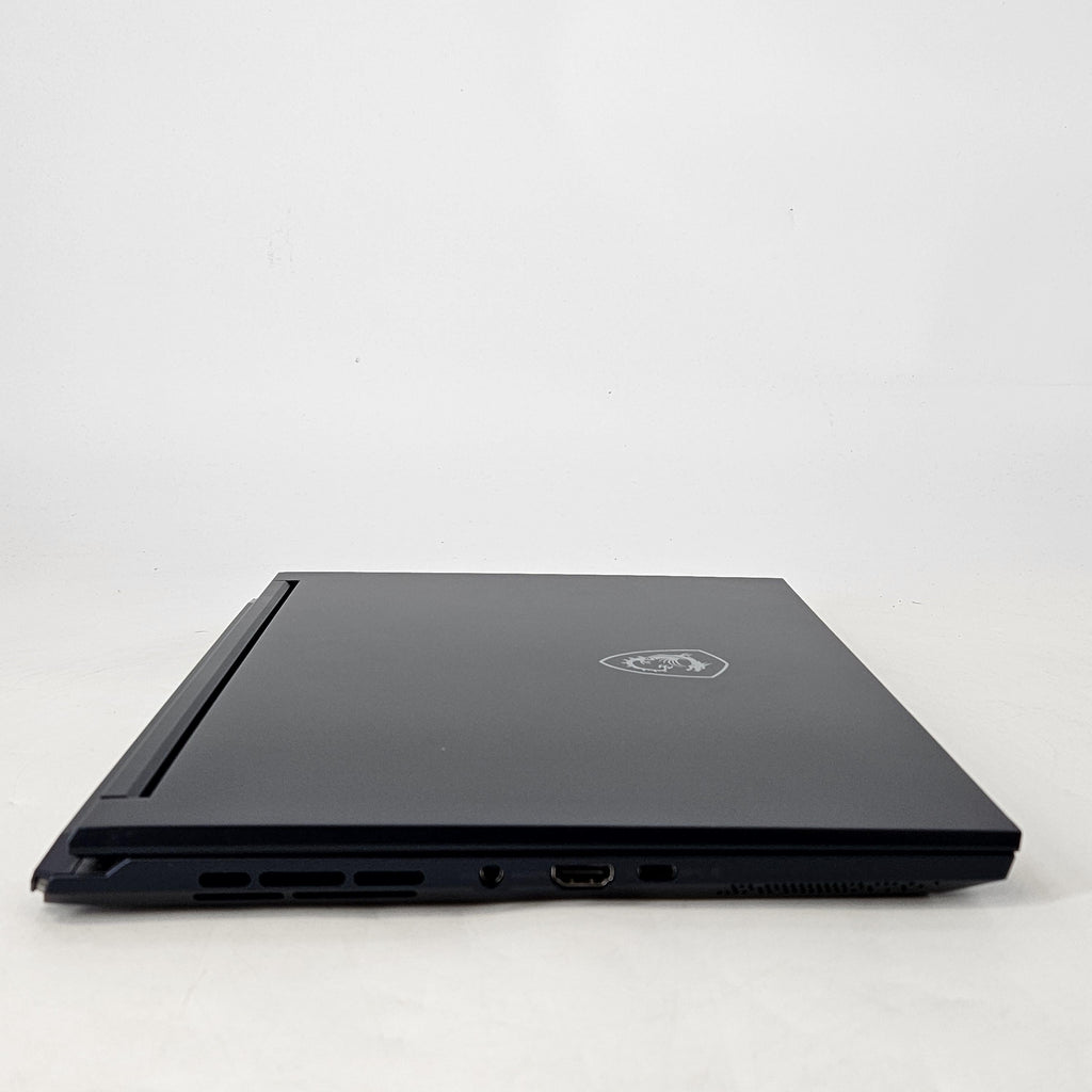MSI Stealth 14 Studio 14 Blue 2.4 GHz Intel Core i7 13th Gen. 16GB RAM 1TB Solid State Drive NVIDIA GeForce RTX 4060 8 GB